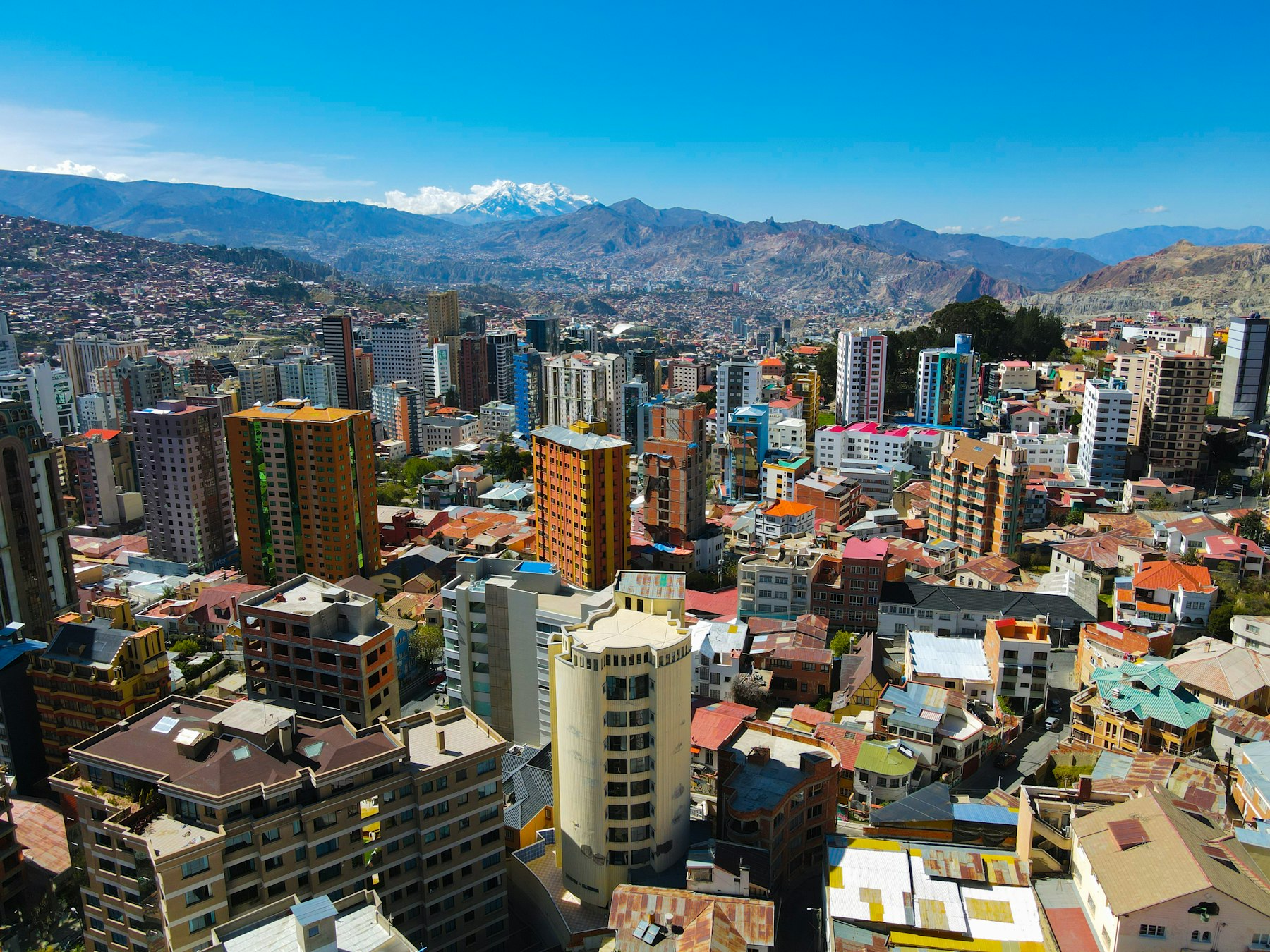 Andean highland city and energy infrastructure at dusk, Bolivia